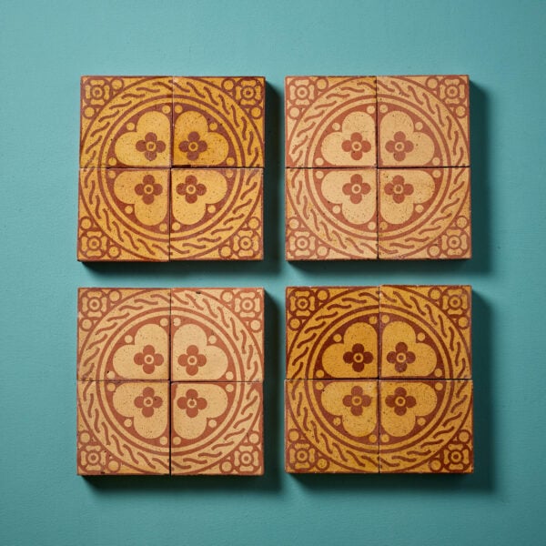 A Set of Sixteen Reclaimed Encaustic W.Godwin Floral Tiles