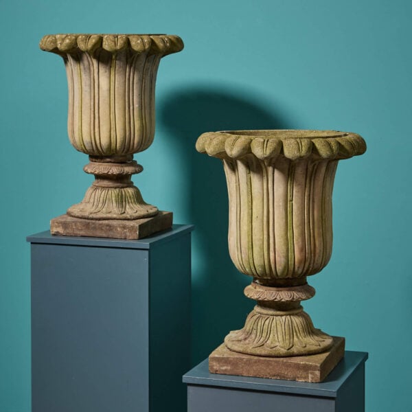 Pair of Weathered Composition Stone Tulip Urns